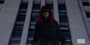 Batwoman at Bat-Signal rally, with her neck exposed