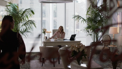 Lillian in her office at Luthor Foundation