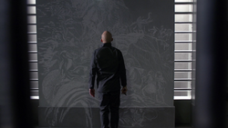 Lex engrave a bass-relief on his cell's wall