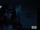 Batwoman listens to audio signals.png