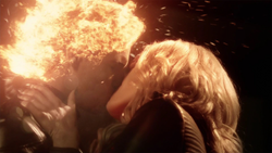 Deathstorm and Killer Frost kiss