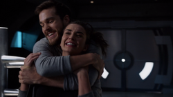 Mon-El and Imra play fighting