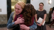 Regina hugs her daughter Izzy.