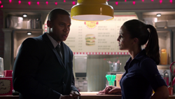 Diggle talks to Carly about his job