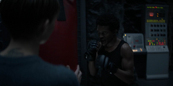 Luke is boxing in the Batcave