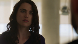 Lena while Lex explains their Crisis situation