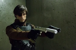 Deadshot dual-wielding two pistols