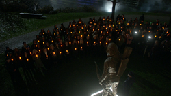 The citizens of Star City gather to memorialize the Green Arrow