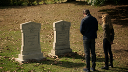 Oliver and Mia in front of Emiko and Robert's graves