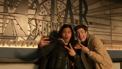 Cisco Ramon and Barry Allen taking selfies with the S.T.A.R. Laboratories sign