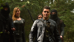 Adrian Chase, Black Siren, and Evelyn Sharp confront Team Arrow on Lian Yu