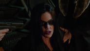 Felicity Smoak as a vigilante in Doomworld reality