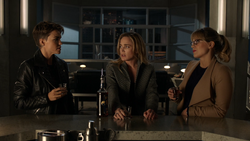 Kate, Sara, and Kara drink to Oliver