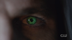 Oliver Queen's eyes glow