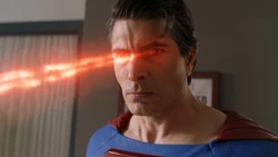 Clark emitting red heat vision.