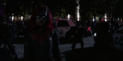 Ryan activates batsuit's eye-lense.