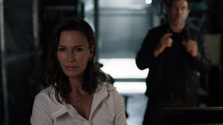 Mercy and Otis talk to Agent Liberty.