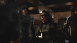 Black Canary uses her scream on Parks