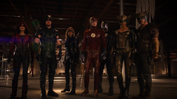 Speedy, Green Arrow, Black Canary, The Flash, Spartan, Hawkgirl and Carter Hall after facing Vandal Savage