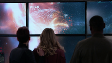 The D.E.O. watching Argo's destruction