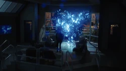 Deathstorm appears to Caitlin.