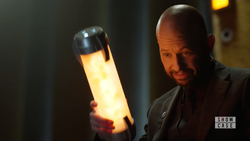 Lex mockingly salutes Brainy.