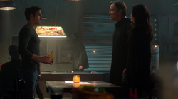 Mon-El with his parents in the Alien Bar