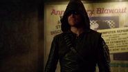 Oliver as the Hood/Arrow