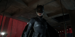 Kate Kane looks down on Gotham in her repurposed Batman suit