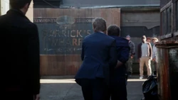 Eddie as a police detective of the CCPD.