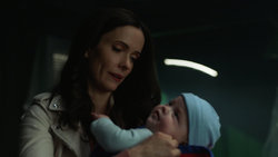 Lois rescues her baby on Earth-16