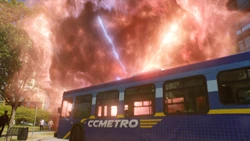 A portal opens next to the bus.