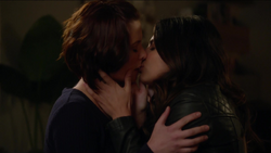 Maggie kisses Alex