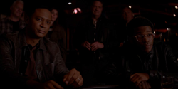 John Diggle and Luke Fox play poker