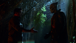 J'onn preparing to shake Jeremiah Danvers' hand