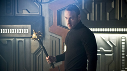 Scythian Torvill wields Carter Hall's mace