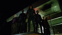 Team Arrow overlook the panic at an outdoor shopping mall