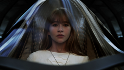 Kara in her pod preparing to be rocketed away from Krypton