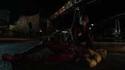 Kid Flash hurt by The Rival