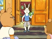 Wearing his summer clothes.