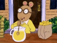 Arthur making Lemonade in front of his house