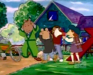 Muffy as the director with a megaphone