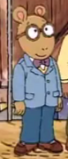 Arthur in his blue tuxedo with a purple bowtie