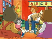 Lisa and the class gathered around to listen to Ms. Morgan.