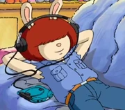 Listening music with headphones in "The Last King of Lambland".