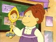 Muffy with a pencil braided hairstyle.