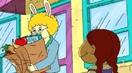 Carrying a bag of groceries