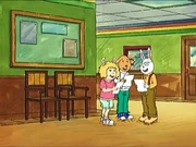 Brian laughing with two other fourth graders.