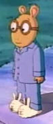 Arthur in his blue pajamas and white bunny slippers