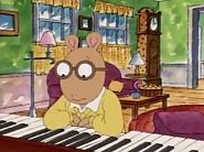 Arthur thinking about the piano